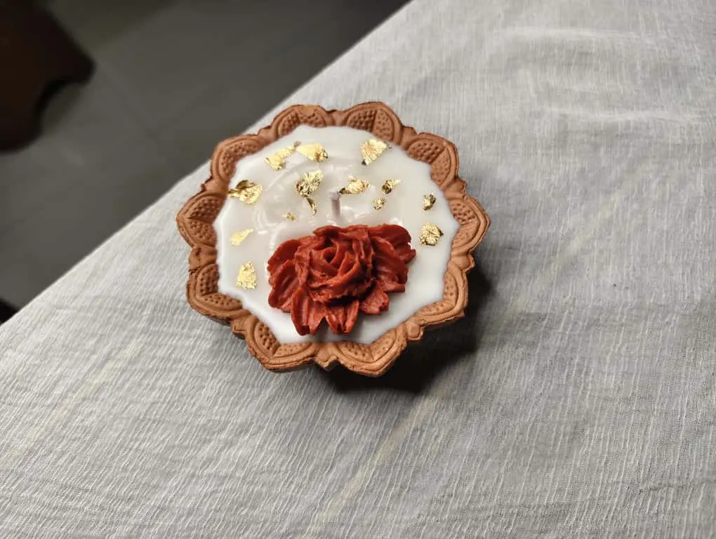 Red flower diya candle 
